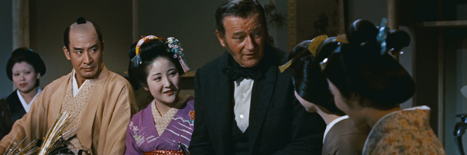 John Wayne stellt sich den Geishas vor.