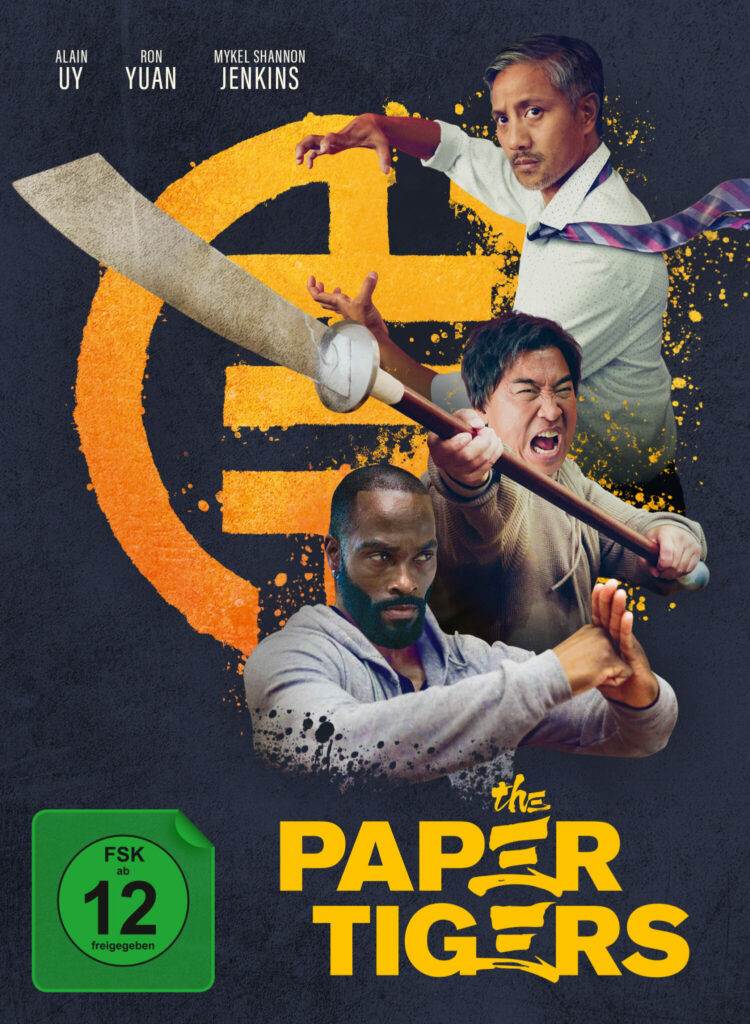 Die drei Freunde sind auf dem Cover des Mediabooks von The Paper Tigers in Kampfposition zu sehen.