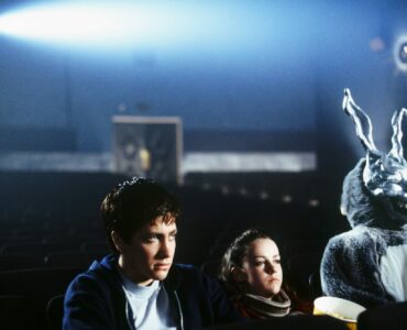 Donnie, Gretchen und Frank sitzen im Kino. | Donnie Darko