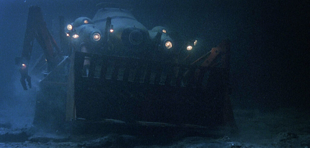 Ein Unterwasserfahrzeug mit großer Schaufel am Meeresgrund